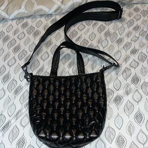 Lug NWOT Tip Toe Crossbody in Metallic Black